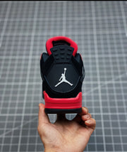 Jordan 4 Negras y rojas